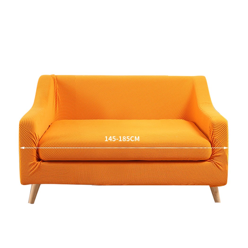 DreamZ Couch Sofa Seat Covers in vibrant orange, designed for 2-seater sofas, showcasing stretchable fabric and well-stitched edges.