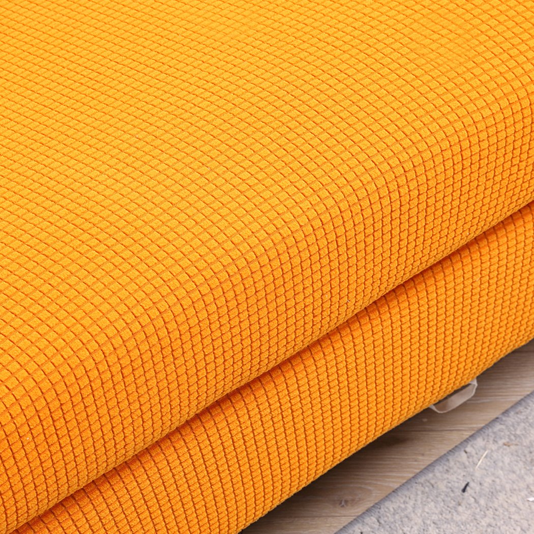 DreamZ Couch Sofa Seat Covers in vibrant orange, designed for 2-seater sofas, showcasing stretchable fabric and well-stitched edges.