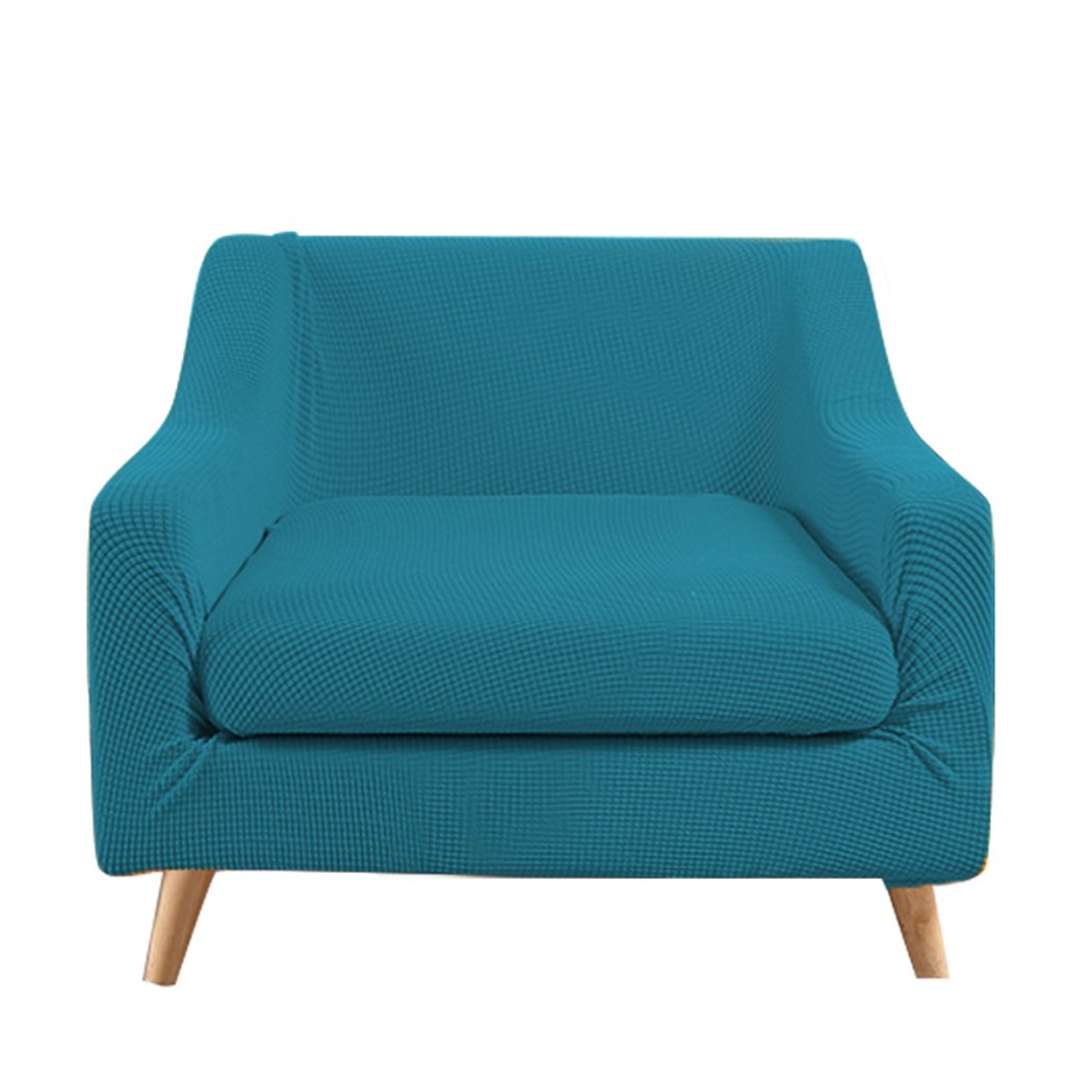 DreamZ Couch Sofa Seat Cover in vibrant green, showcasing its stretchable fabric and well-stitched edges, designed for 1-seater sofas.