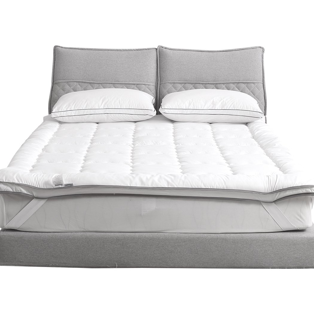 DreamZ Luxury Bedding Pillowtop Mattress Topper in white, showcasing its plush 5cm thickness and sewn pockets for even filling distribution.