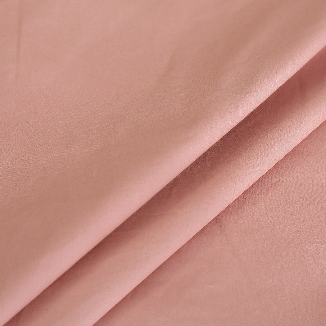 DreamZ Weighted Blanket in pink, featuring dual covers made of cotton and polyester, designed for deep relaxation and comfort.