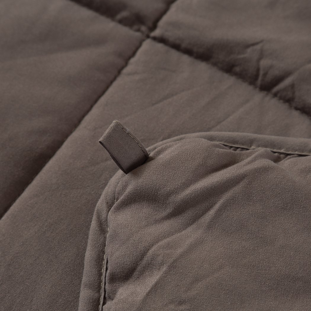 DreamZ Weighted Blanket in mink color, featuring a soft polyester exterior and glass bead filling for deep relaxation and comfort.