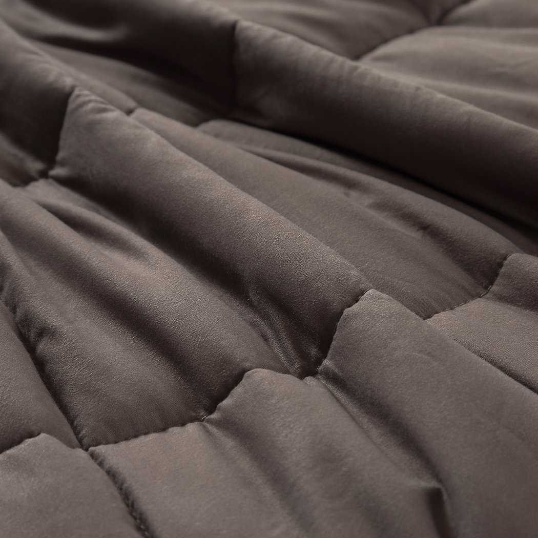 DreamZ Weighted Blanket in mink color, featuring a soft polyester exterior and glass bead filling for deep relaxation and comfort.