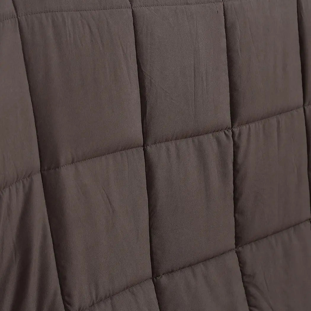 DreamZ Weighted Blanket in mink color, featuring a soft polyester fabric and glass bead filling for deep relaxation and comfort.