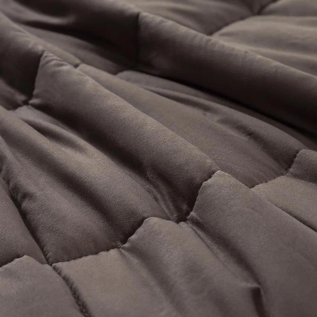 DreamZ Weighted Blanket in mink color, featuring a soft polyester fabric and glass bead filling for deep relaxation and comfort.