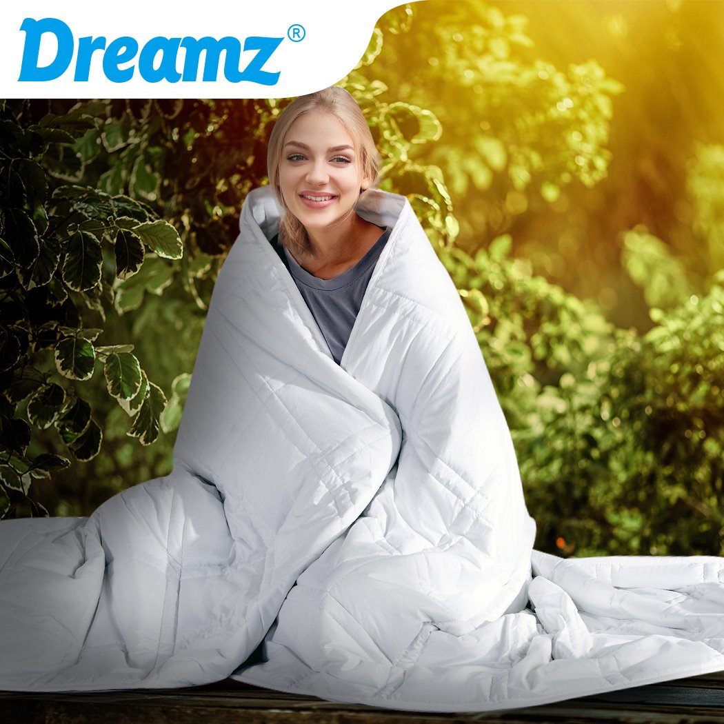 DreamZ Weighted Blanket in white, made of 100% hypoallergenic cotton, designed for adults to provide deep relaxation and comfort.