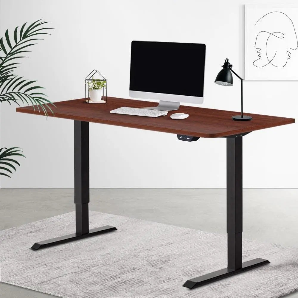 Electric Motorised Height Adjustable Standing Desk with a black frame, showcasing its sleek design and adjustable features.