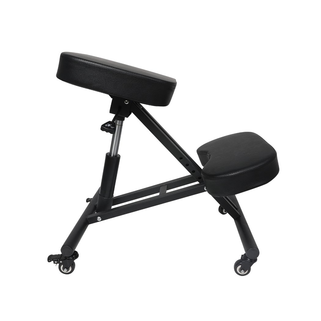 Ergonomic kneeling chair with adjustable height and padded seat, designed for home office use.