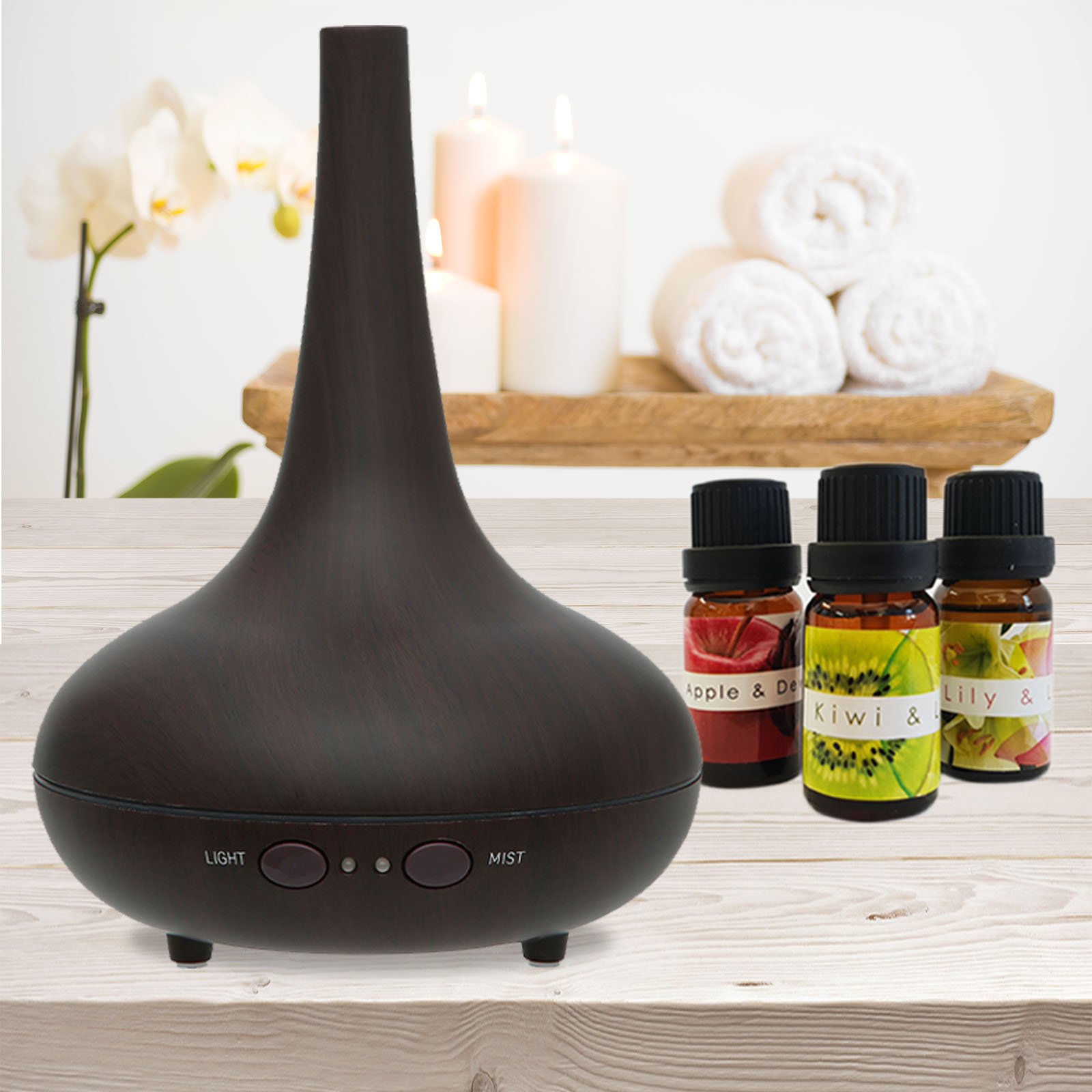 Milano Ultrasonic Aromatherapy Diffuser with LED lights and essential oils, designed for home and office use.