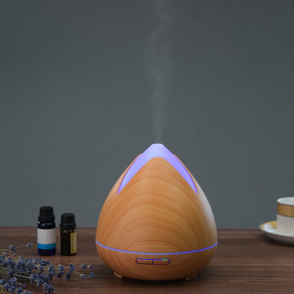 Essential Oils Ultrasonic Aromatherapy Diffuser by PureSpa with 7 LED lights and essential oils.