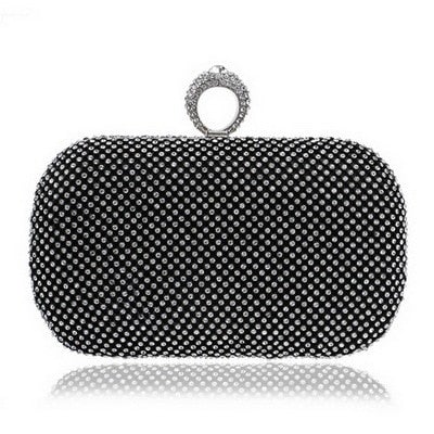 Elegant diamond-studded evening clutch bag with chain shoulder strap, perfect for weddings and parties.