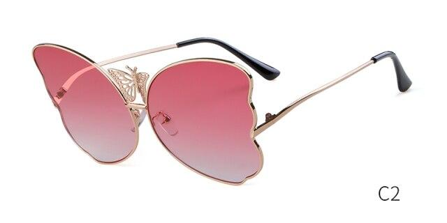 Fashion butterfly sunglasses for women in pink, featuring oversized lenses and a vintage design, perfect for sun protection.