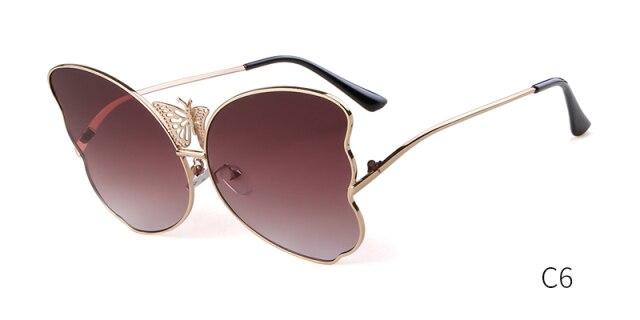 Fashion butterfly sunglasses for women in pink, featuring oversized lenses and a vintage design, perfect for sun protection.