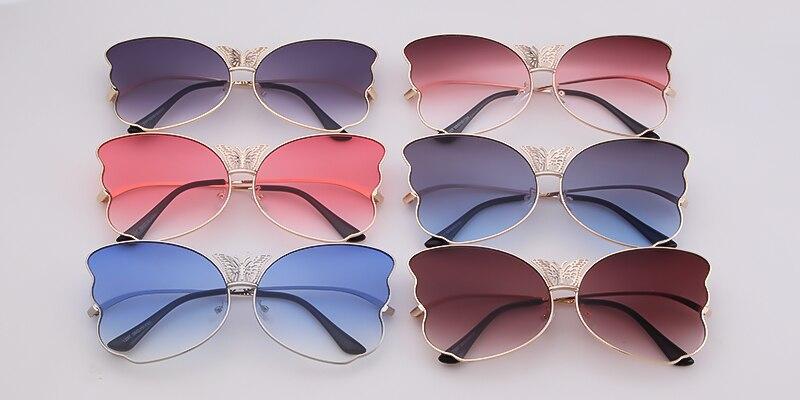 Fashion butterfly sunglasses for women in pink, featuring oversized lenses and a vintage design, perfect for sun protection.