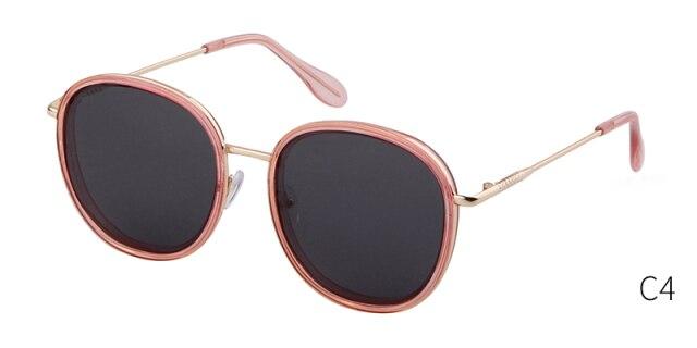 Fashion round sunglasses featuring green candy lenses and a pink frame, designed for both men and women, showcasing a luxurious and trendy style.