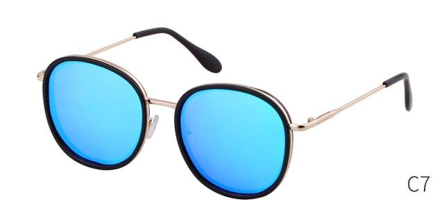 Fashion round sunglasses featuring green candy lenses and a pink frame, designed for both men and women, showcasing a luxurious and trendy style.