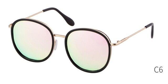 Fashion round sunglasses featuring green candy lenses and a pink frame, designed for both men and women, showcasing a luxurious and trendy style.