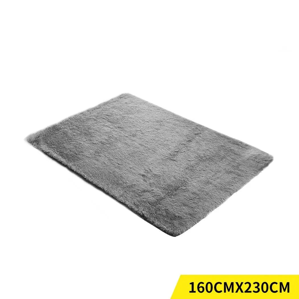 Large shaggy floor rug in grey color with a plush 35mm high pile, perfect for bedroom or living room decor.