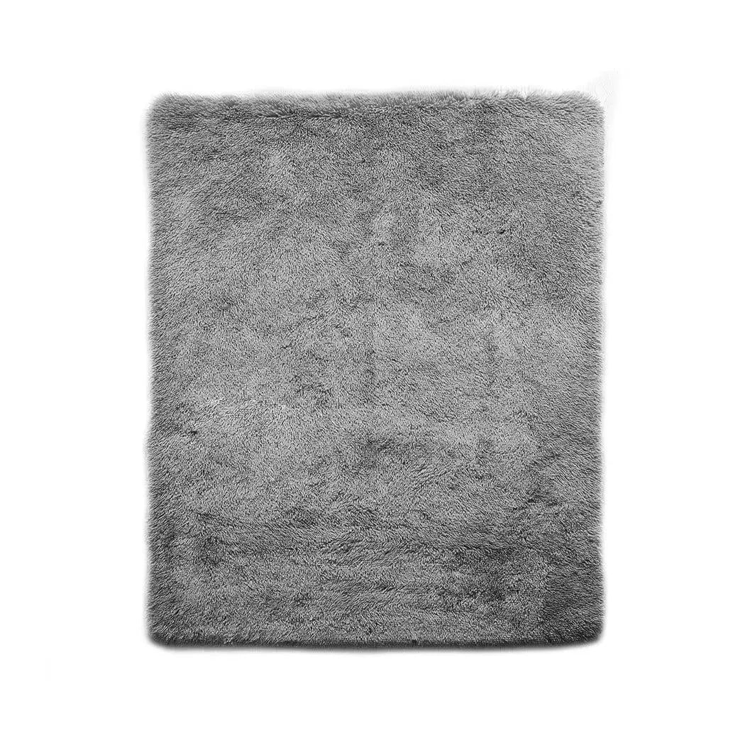 Large shaggy floor rug in grey color with a plush 35mm high pile, perfect for bedroom or living room decor.