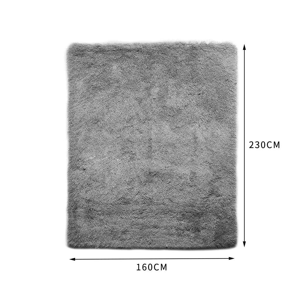 Large shaggy floor rug in grey color with a plush 35mm high pile, perfect for bedroom or living room decor.