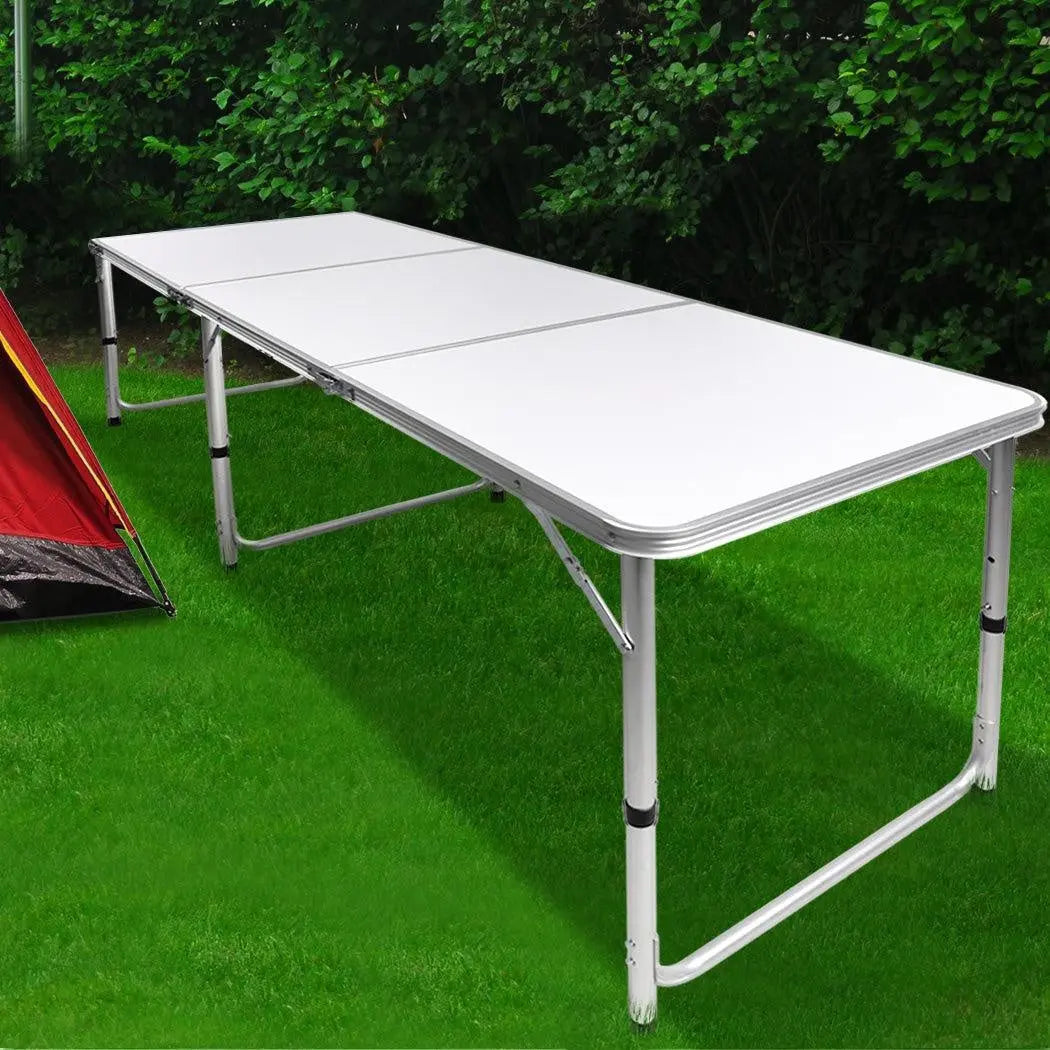 A lightweight and portable folding camping table made of aluminum with a smooth MDF tabletop, ideal for outdoor picnics and camping trips.