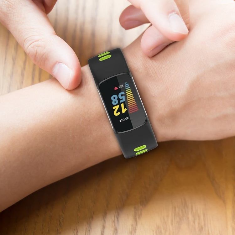 Black Lime silicone watch band for Fitbit Charge 6, showcasing its stylish design and comfortable fit.