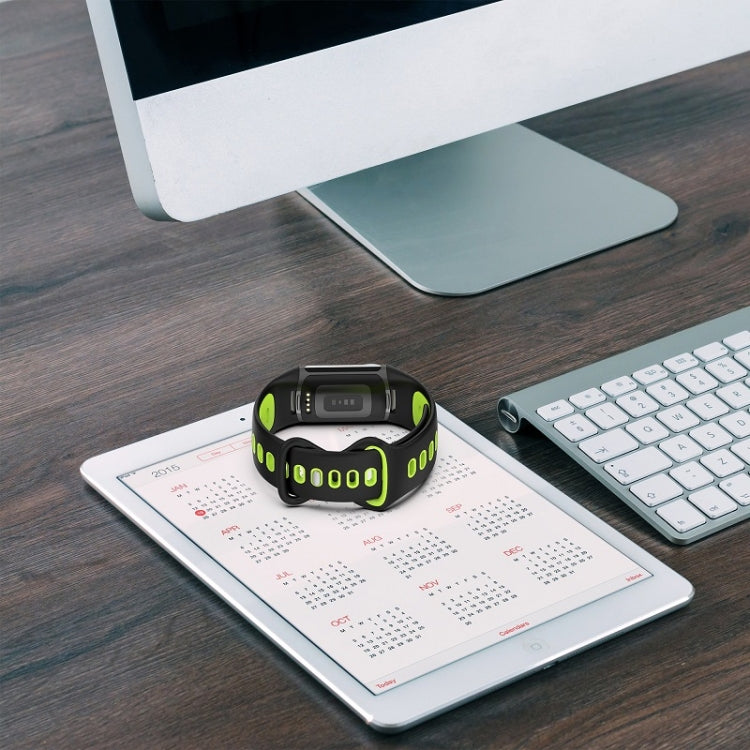 Black Lime silicone watch band for Fitbit Charge 6, showcasing its stylish design and comfortable fit.