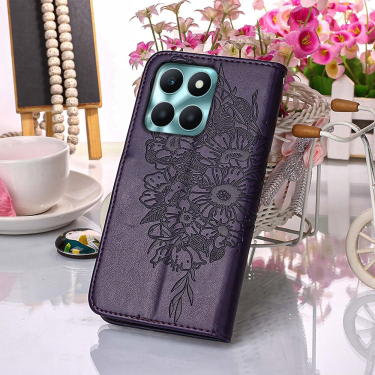 Dark purple embossed butterfly leather phone case designed for Honor X6a, showcasing its elegant design and practical features.