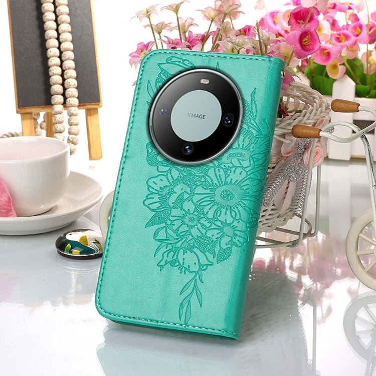 Green embossed butterfly leather phone case for Huawei Mate 60 Pro, showcasing its elegant design and card slot feature.