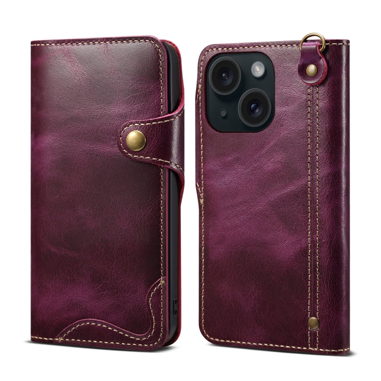 Denior Oil Wax Cowhide Magnetic Button Case for iPhone 13 mini, showcasing its luxurious leather texture and card slots.