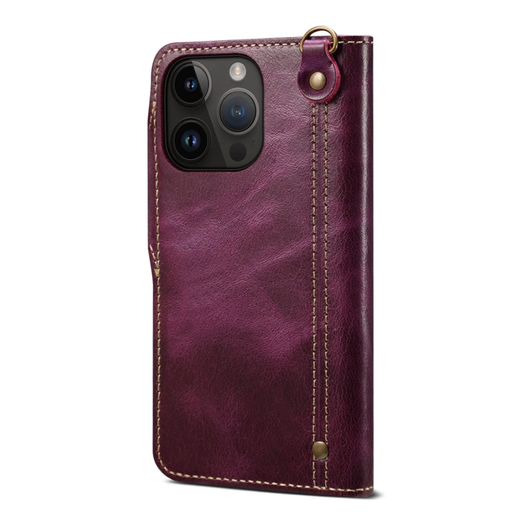 Denior Oil Wax Cowhide Magnetic Button Case for iPhone 13 mini, showcasing its luxurious leather texture and card slots.