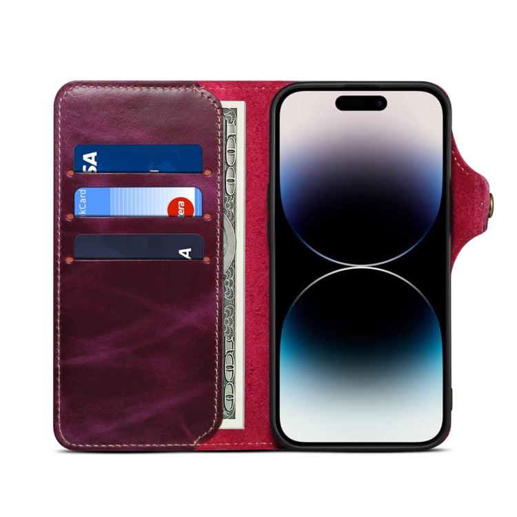 Denior Oil Wax Cowhide Magnetic Button Case for iPhone 13 mini, showcasing its luxurious leather texture and card slots.