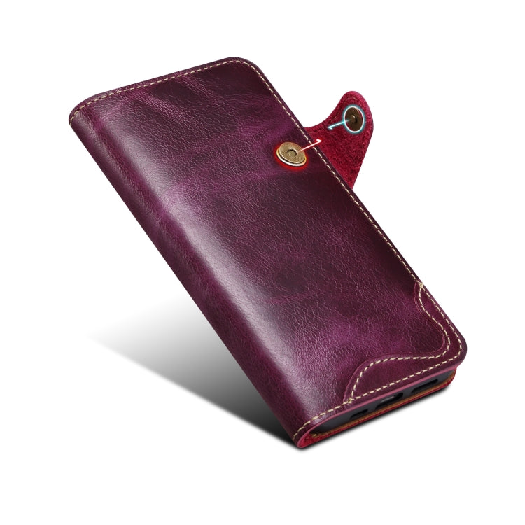 Denior Oil Wax Cowhide Magnetic Button Case for iPhone 13 mini, showcasing its luxurious leather texture and card slots.