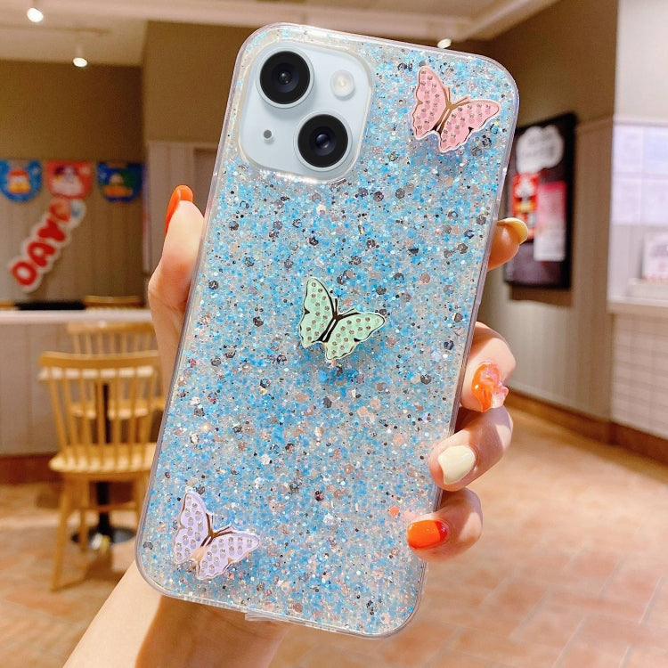 Stylish iPhone 13 mini case featuring colorful butterflies and sparkling rhinestones, made from durable epoxy TPU material.