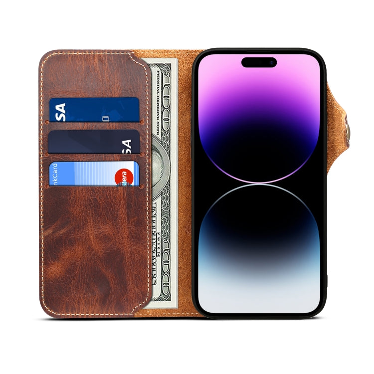 For iPhone 15 Plus Denior Oil Wax Cowhide Magnetic Button Genuine Case showcasing its luxurious cowhide texture and card slots.