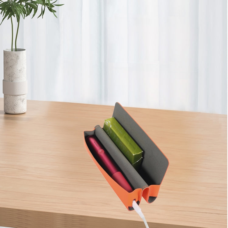 Litchi pattern leather storage bag for IQOS ILUMA ONE, showcasing its stylish design and compact size.