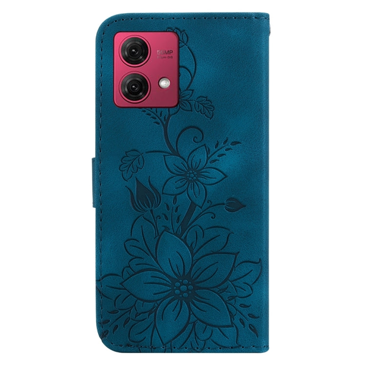 Dark blue embossed leather phone case for Motorola Moto G84, showcasing its elegant design and functional features.