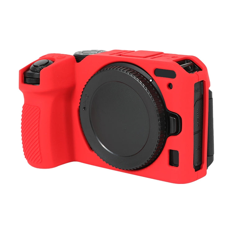 Red soft silicone protective case for Nikon Z 30 camera with lens cover, showcasing its sleek design and durable material.