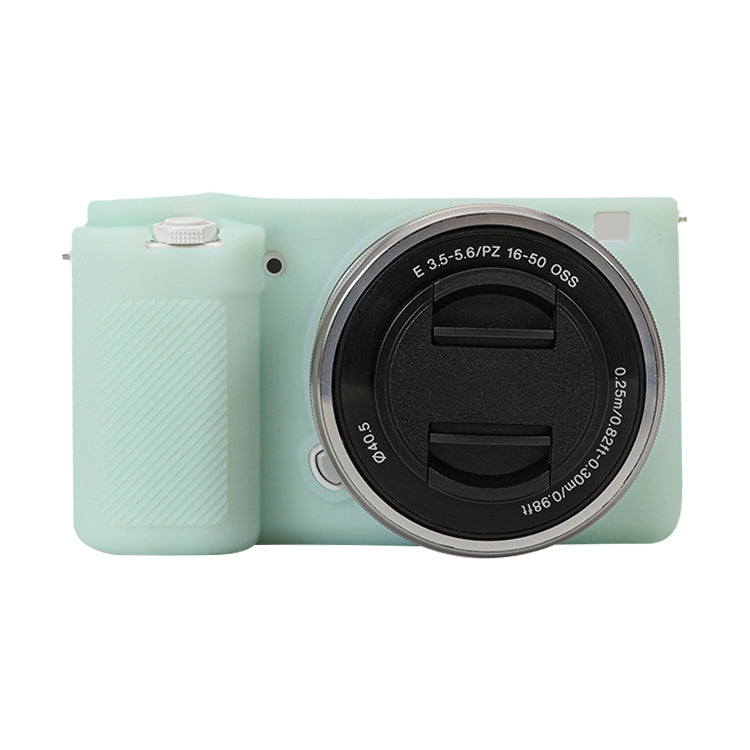 Light green soft silicone protective case for Sony ZV-E10 camera, showcasing its snug fit and durable design.