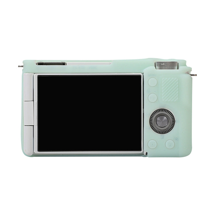 Light green soft silicone protective case for Sony ZV-E10 camera, showcasing its snug fit and durable design.