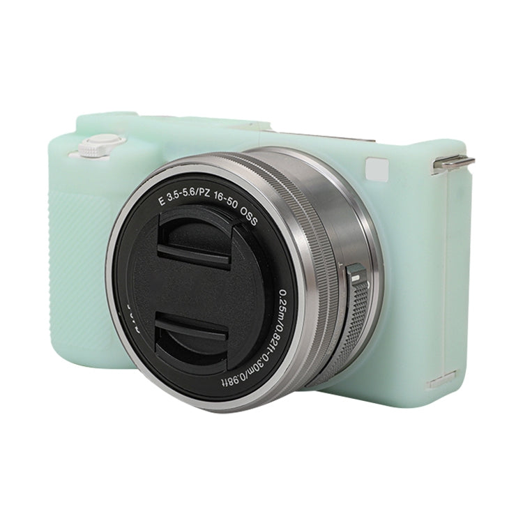 Light green soft silicone protective case for Sony ZV-E10 camera, showcasing its snug fit and durable design.