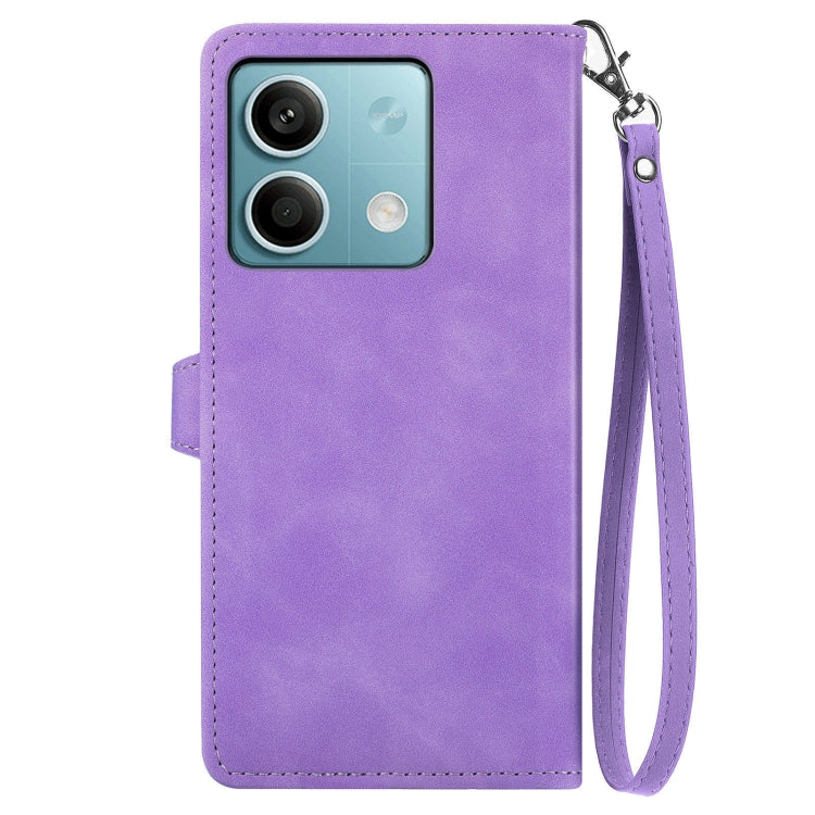 Stylish embossed flower zipper leather phone case for Xiaomi Redmi K60 Ultra, showcasing its elegant design and practical features.