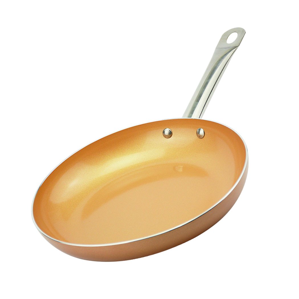 A sleek non-stick stainless steel frying pan with a copper-infused surface, ideal for healthy cooking.