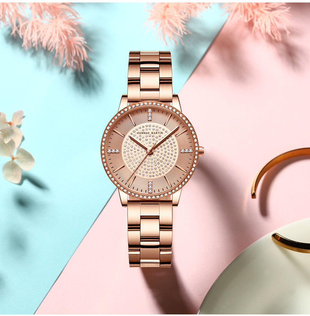 Elegant women's wristwatch featuring a full solid stainless steel strap, rose gold accents, and sparkling rhinestones, perfect for luxury styling.