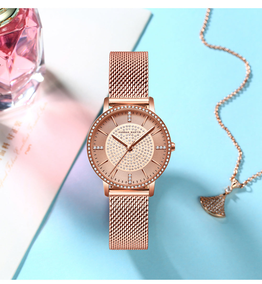 Elegant women's wristwatch featuring a full solid stainless steel strap, rose gold accents, and sparkling rhinestones, perfect for luxury styling.