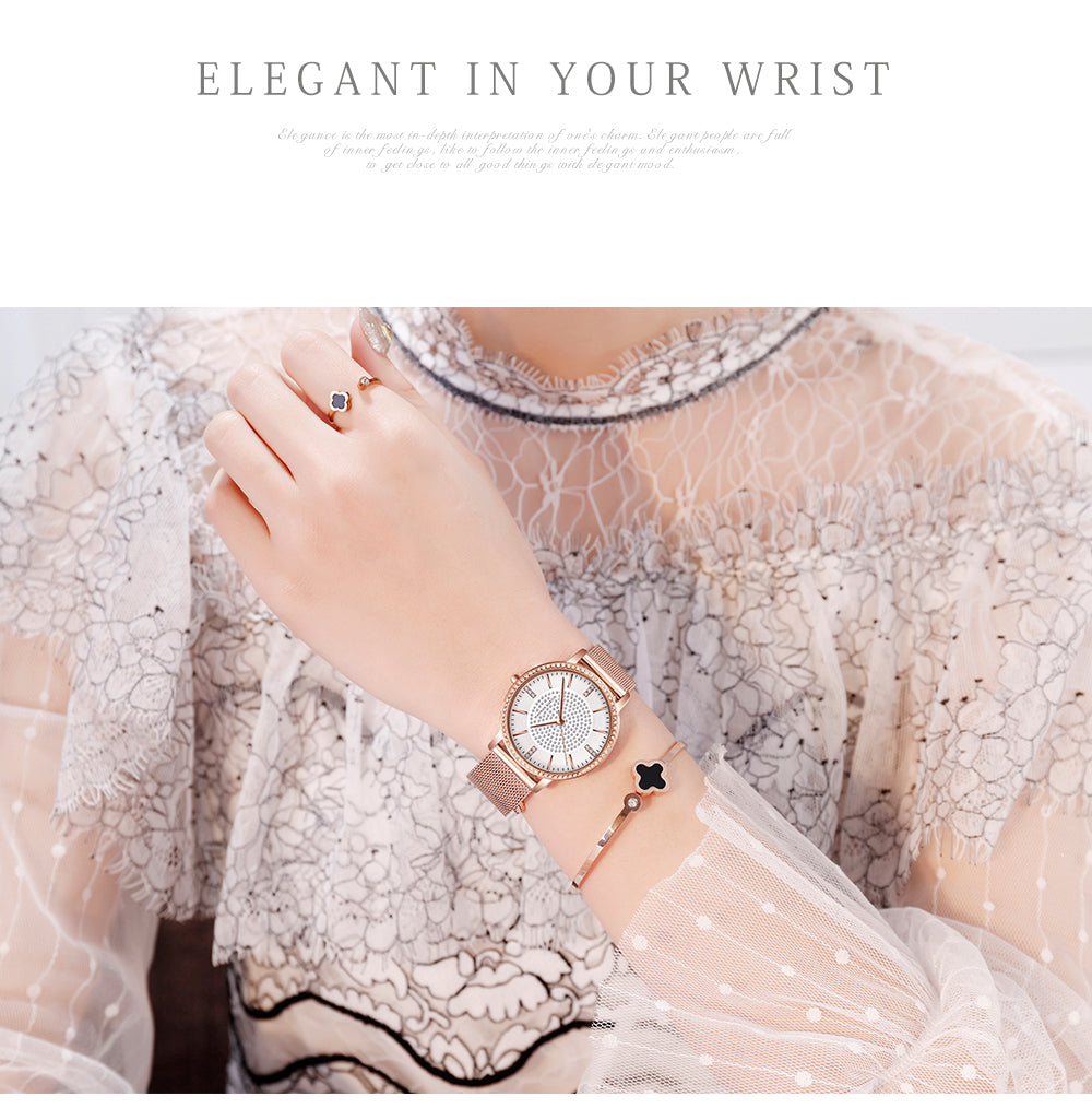 Elegant women's wristwatch featuring a full solid stainless steel strap, rose gold accents, and sparkling rhinestones, perfect for luxury styling.