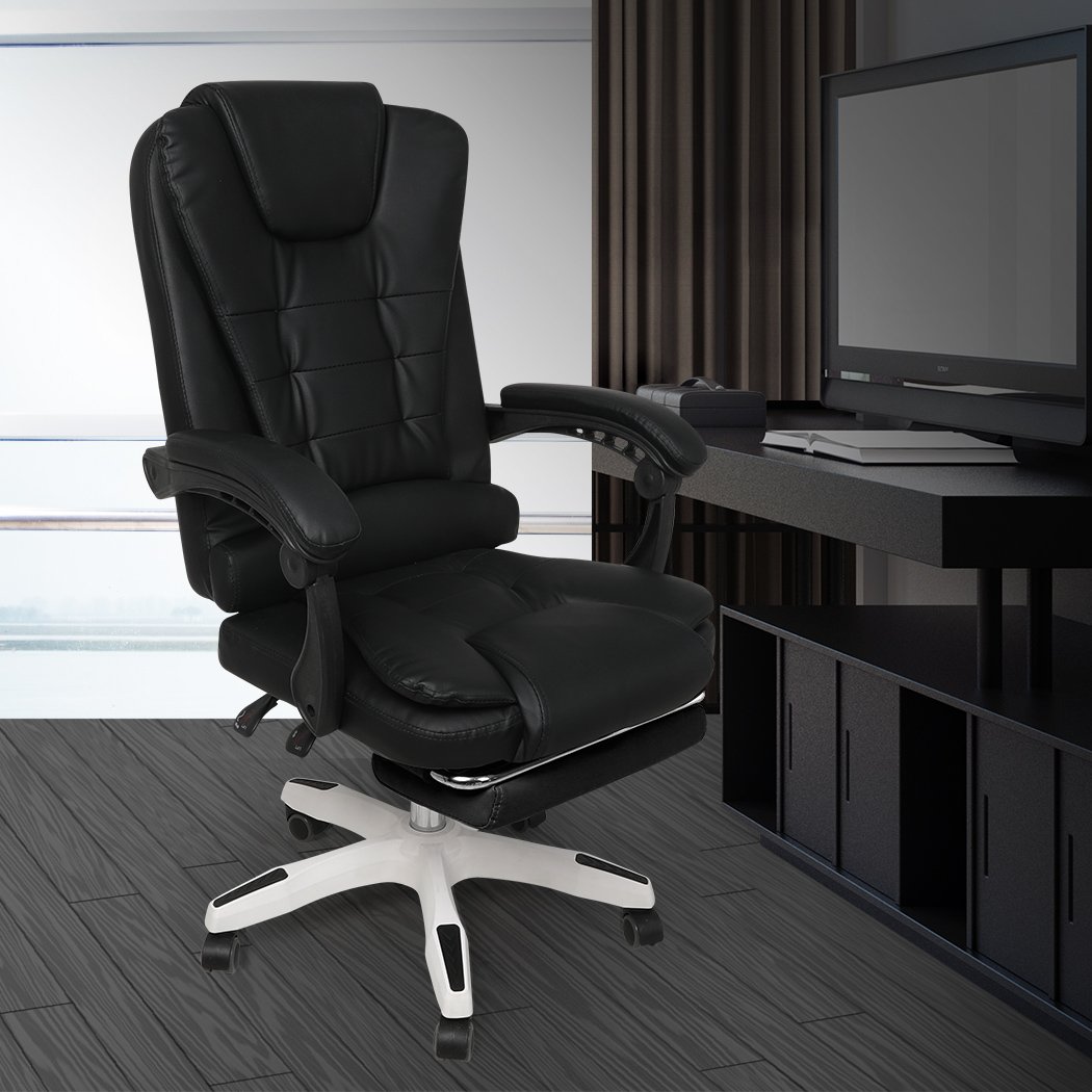 Gaming chair with PU leather upholstery, adjustable height, reclining backrest, and retractable footrest, designed for comfort and support.