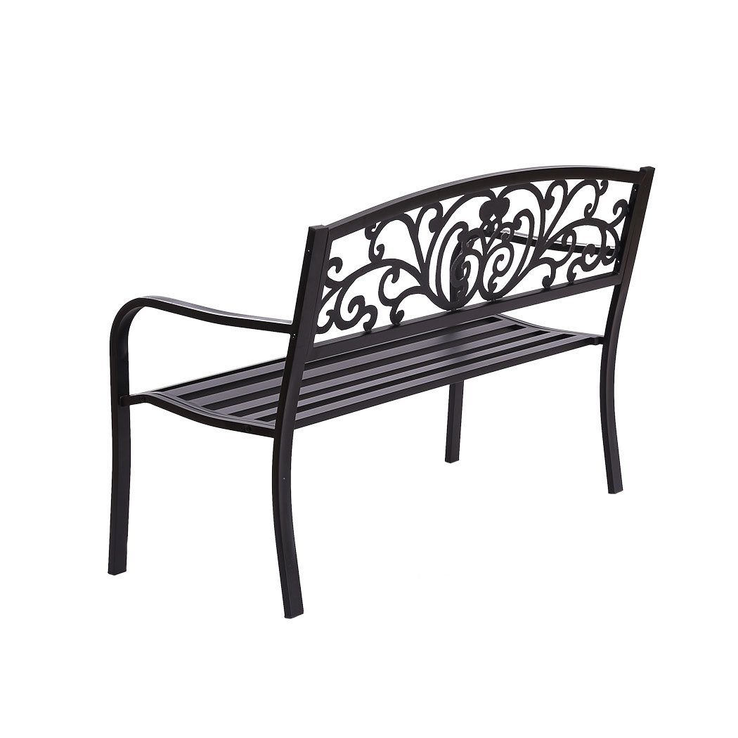 A stylish black garden bench made of galvanized steel and cast iron, featuring a floral backrest and smooth armrests, perfect for outdoor relaxation.