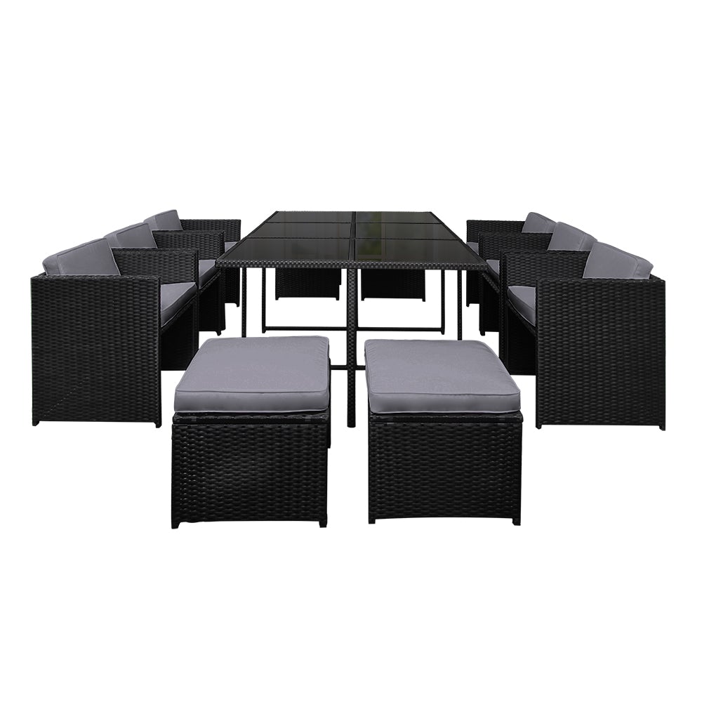 Gardeon 11 Piece PE Wicker Outdoor Dining Set in Black with grey cushions, featuring a glass top table and stylish design.