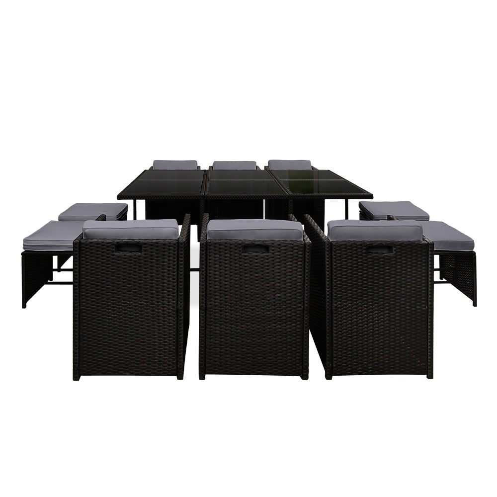 Gardeon 11 Piece PE Wicker Outdoor Dining Set in Black with grey cushions, featuring a glass top table and stylish design.